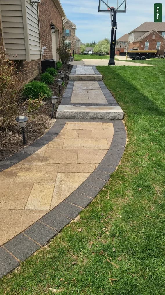 Walkway with tree and shrub planting